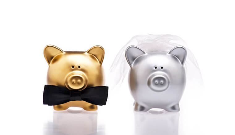 piggy banks dressed as bride and groom