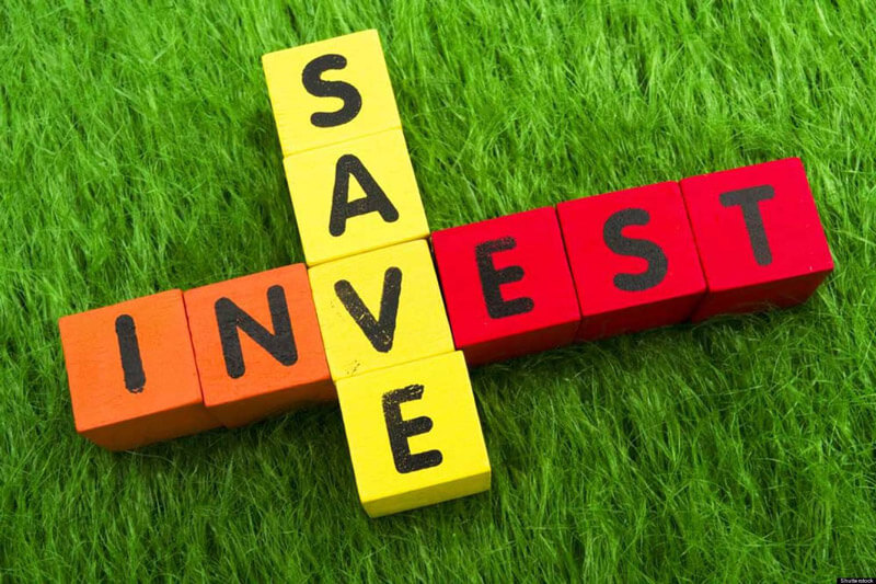 Blocks spelling out Save and Invest